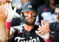 Late homers help Twins end losing skid against Royals