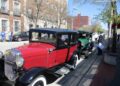 Two Model A Fords are parked outside the Joliet Area Historical Museum as their owners start on the Route 66 Red Carpet Corridor Festival on Saturday, May 7, 2022.