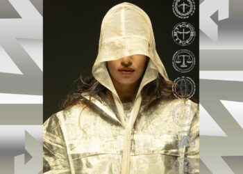 Image may contain Clothing Coat Adult Person Hood Raincoat and Fashion