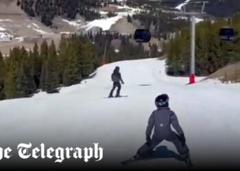 Meghan shares video of Harry skiing with Archie