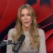 Megyn Kelly speaking into a microphone.