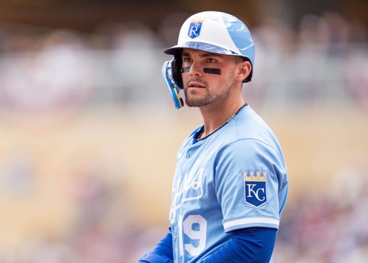 May 24, 2025; Minneapolis, Minnesota, USA; The third base umpire calls Kansas City Royals left fielder Michael Massey (19) out for swinging on a ball pitched by Minnesota Twins starting pitcher Zebby Matthews (52, not shown) in the second inning at Target Field. Mandatory Credit: Matt Blewett-Imagn Images