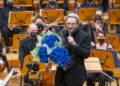 Photo of late conductor Michael Tilson Thomas on stage.