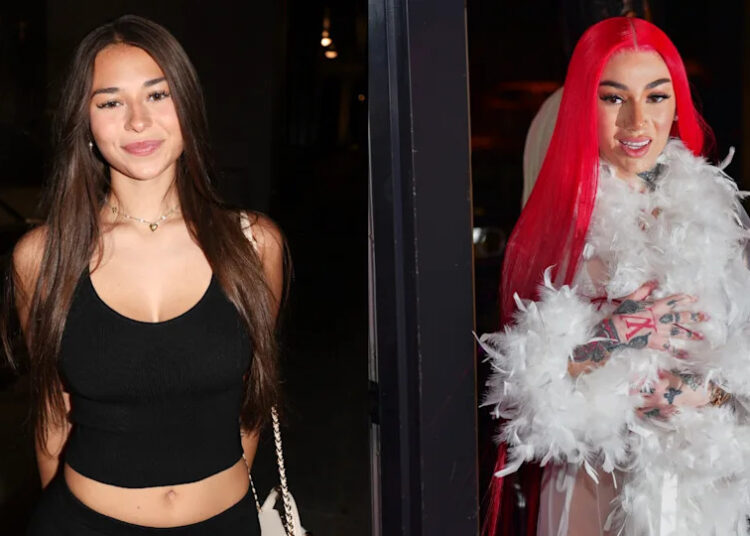 Sophie Rain has long brown hair and wears a black outfit. Bhad Bhabie has bright red hair and a white feather boa.