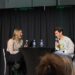 Max Greenfield getting interviewed by the president of Platform Personalities