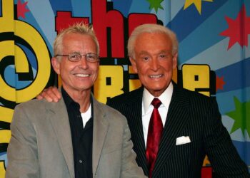 "Price is Right" host Bob Barker, right, and producer Roger Dobkowitz appear on set during the taping of the show's 34th season premiere at CBS Television City in Los Angeles on June 9, 2005.