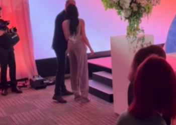 Prince Harry and Meghan shared a blink-and-you'll-miss-it kiss on the lips