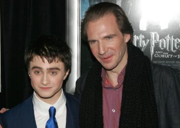Actors Daniel Radcliffe and Ralph Fiennes pose for a picture at a premiere of Harry Potter and the Goblet of Fire.