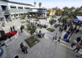 Visitors gather during the official opening of the newly redesigned...