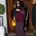 Rihanna&nbsp;and A$AP Rocky are spotted leaving Siena restaurant in Paris, France, with Rihanna carrying a sold-out Dior saddle bag featuring a bright yellow Dracula design