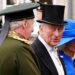 King Charles III smiles during a garden party at the Palace of Holyroodhouse in Edinburgh, Scotland, on July 1, 2025, on the first day of the king and queen's visit to Scotland.
