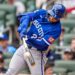 Kansas City Royals catcher Carter Jensen (22) swings at a pitch.