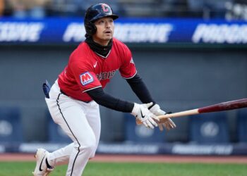 Cleveland Guardians' Steven Kwan watches his home run in the thirtd inning of a baseball game against the Kansas City Royals in Cleveland, Monday, April 6, 2026. (AP Photo/Sue Ogrocki)