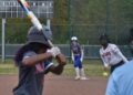 Inara Johnson waits for a pitch from Omarah Butler.