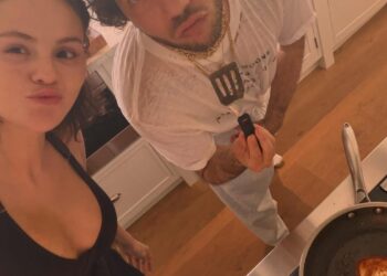 Selena Gomez and Benny Blanco cooking.