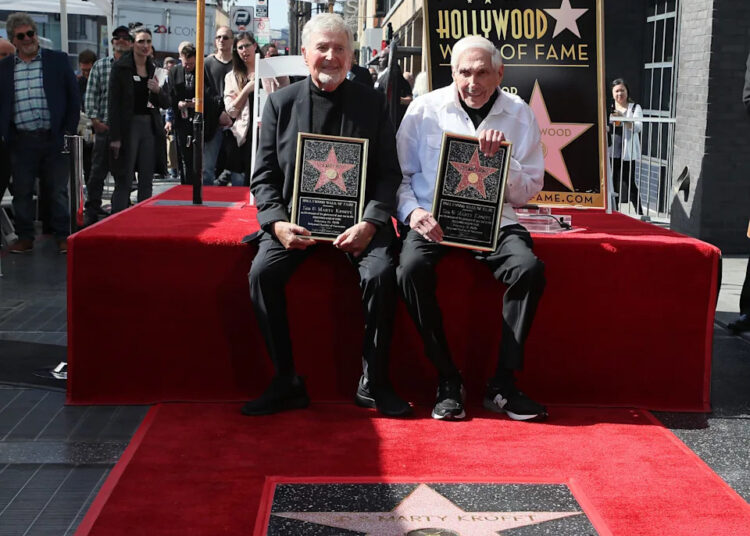 Sid Krofft, left, and Marty Kroff pose together during their Hollywood Walk of Fame ceremony on Feb. 13, 2020, in Hollywood, California.