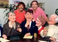 Sid and Marty Krofft stand behind four life-size puppets.