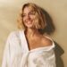 The Euphoria actress poses in a loose-fitting white shirt and a pair of denim shorts