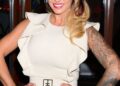 Jodie Marsh in a cinched white dress