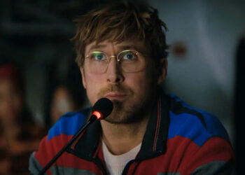 Ryan Gosling at a microphone in Project Hail Mary.