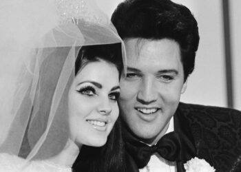 Singer Elvis Presley and his bride Priscilla Ann Beaulieu, pose for photograph following their wedding at the Aladdin Hotel in 1967. -