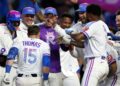 Thomas walks it off in marathon game 11-9, Royals sweep Angels
