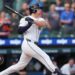 Tigers extend win streak to 6 by rallying in 9th for rain-delayed 10-9 victory over Royals