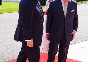 Trump was touching the King on the arm