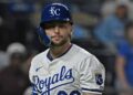 Sep 2, 2025; Kansas City, Missouri, USA;  Kansas City Royals pinch hitter Carter Jensen (22) walks back to the dugout after striking out to end the game against the Los Angeles Angels at Kauffman Stadium. Mandatory Credit: Peter Aiken-Imagn Images