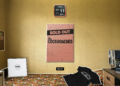 a screenshot of the website wearethecockroaches showing the 90s style digital bedsit, with the teeshirt, the vinyl sleeve, the posters and guitar pics
