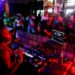 INDIO, CA - APRIL 12, 2026: Festival goers dance while Kailyn Brown performs during her dj set at the Party