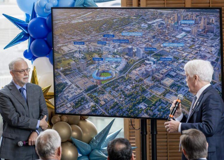 Donald J. Hall Jr., executive chairman and former CEO of Hallmark Cards, speaks alongside John Sherman, chairman and CEO of the Kansas City Royals, as they present a stadium rendering during a ceremony announcing the move to Crown Center on Wednesday, April 22, 2026, in Kansas City.