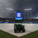 KANSAS CITY, MO - JULY 11: Dark clouds fill the skies as the scoreboard shows a rain delay before an MLB game between the New York Mets and Kansas City Royals on July 11, 2025 at Kauffman Stadium in Kansas City, MO. (Photo by Scott Winters/Icon Sportswire via Getty Images)