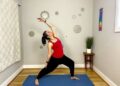 Lisa Jakub performing a yoga stretch