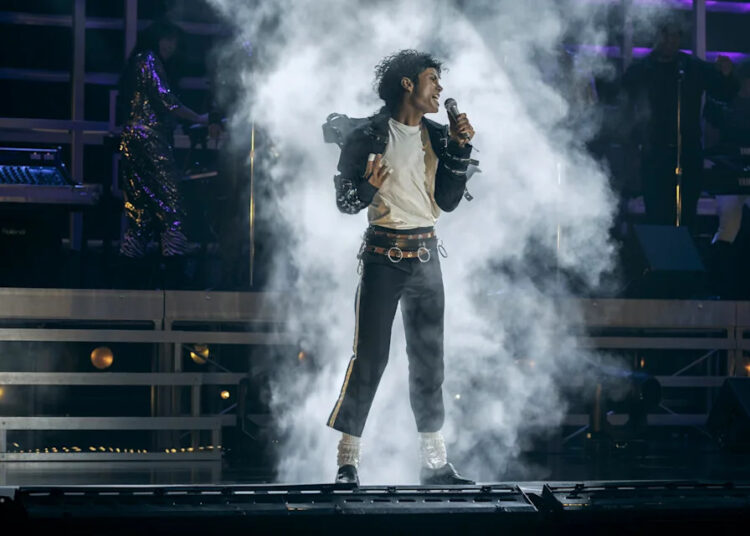 Jaafar Jackson sings onstage as Michael Jackson in the Michael biopic.