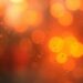 An abstract, dreamy image of soft, blurred shapes in warm hues, evoking the mystical and intuitive nature of astrology.