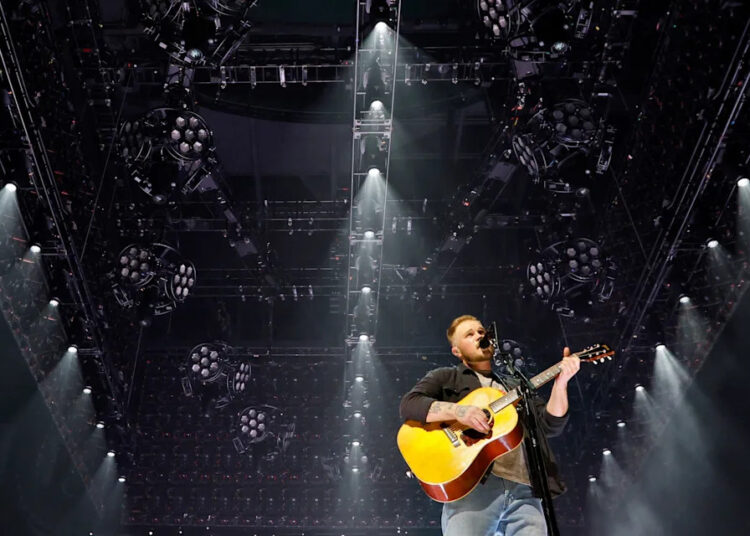 Zach Bryan performs during a show on his "The Quittin' Time Tour" at Paycom Center in Oklahoma City on May, 17, 2024.