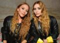 Mary-Kate and Ashley Olsen posing together at a public event
