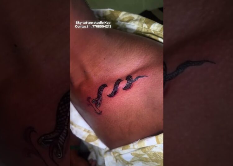 Snake tattoo on Neck / Contact 7708594213 #tattoo #sky tattoo #artist #snake design #art