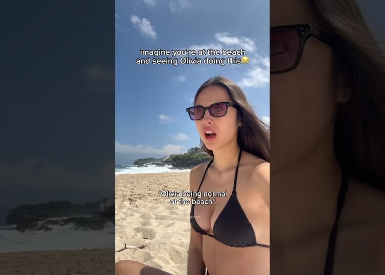 what even is Olivia doing at the beach?😭 #celebrity