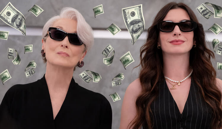 Meryl Streep as Miranda Priestly and Anne Hathaway as Andy Sachs in an elevator surrounded by money in The Devil Wears Prada 2