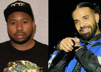 DJ Akademiks wearing a cap and black shirt, and Drake holding a microphone in a blue jacket, smiling.