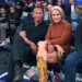 Alex Rodriguez and Jaclyn Cordeiro sitting courtside at a basketball game.