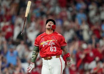 St. Louis Cardinals' Yohel Pozo celebrating after hitting a walk-off single in a baseball game.