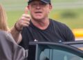 Ross threw a thumbs up at the camera as he climbed into the car