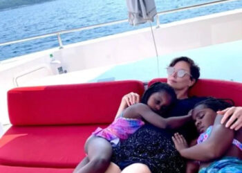 Charlize Theron hugging her daughters on a boat.Credit: Charlize Theron/Instagram