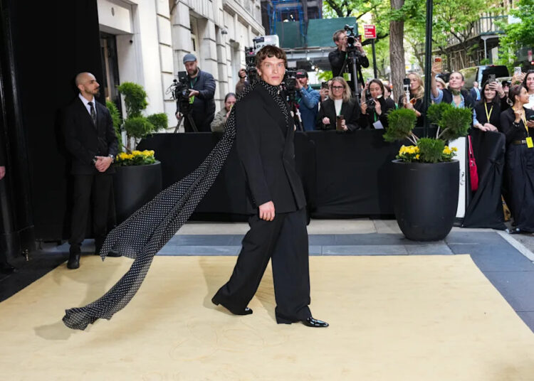 Connor Storrie Rocks Chic All-Black Ensemble in Met Gala Debut