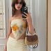 Daisy Edgar-Jones styled a scarf top with a Gucci Raffia Bag at the 2026 Cannes Film Festival