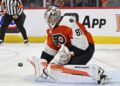 May 7, 2026; Philadelphia, Pennsylvania, USA; Philadelphia Flyers goaltender Dan Vladar (80) makes a save against the Carolina Hurricanes during the second period in game three of the second round of the 2026 Stanley Cup Playoffs at Xfinity Mobile Arena.