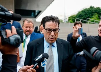 Erik Fleming departs federal court in Los Angeles after being sentenced in connection with the ketamine overdose death of actor Matthew Perry, on Wednesday, May 13, 2026, in Los Angeles. (AP Photo/Caroline Brehman)
